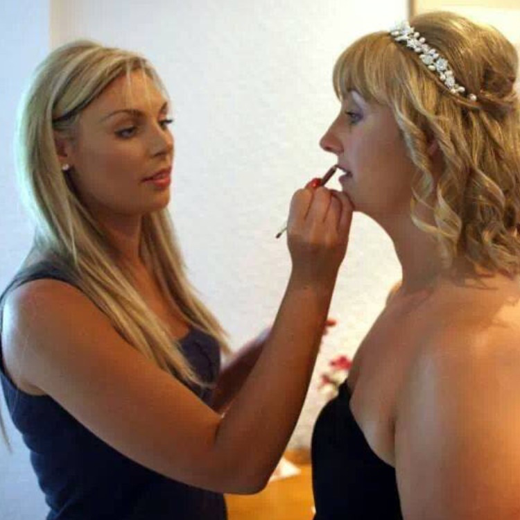 Kate applying makeup